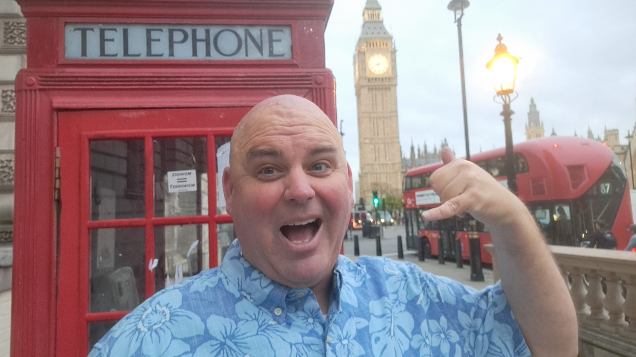 Scott Sylvan Bell in London — Hawaiian shirt, Big Ben, shaka sign — Call Me